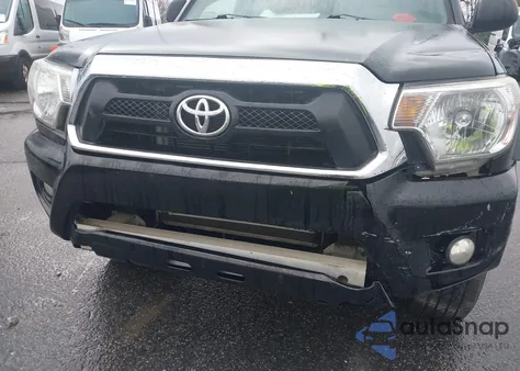 2015 Toyota Tacoma Base V6 z USA, uszkodzony, nr VIN 5TFMU4FN1FX031919
